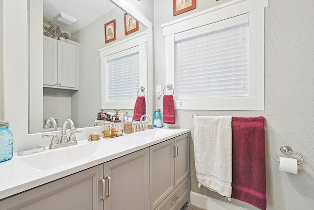 bathroom featuring vanity