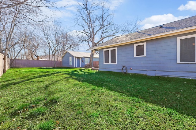 view of yard with a storage shed