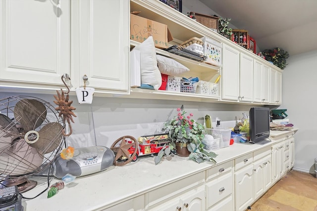 kitchen featuring white cabinetry