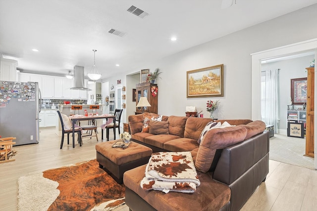 living room featuring light wood-type flooring