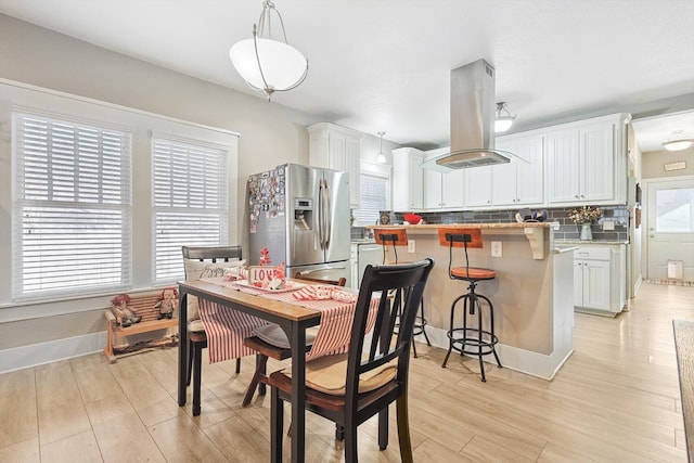 dining area featuring light hardwood / wood-style flooring