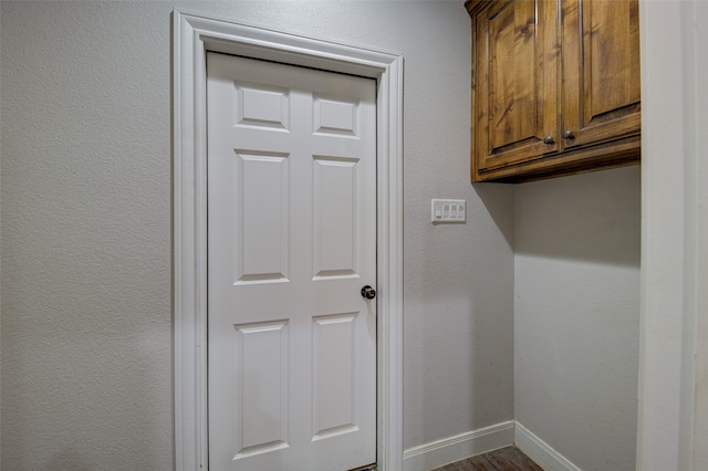 laundry room featuring hardwood / wood-style floors