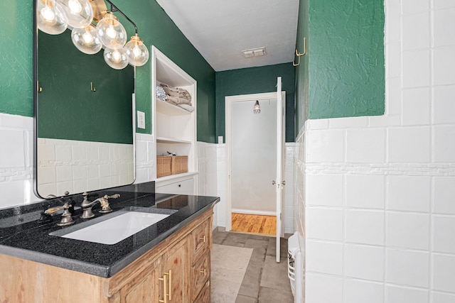 bathroom featuring vanity and tile patterned flooring