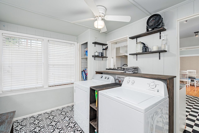 clothes washing area with washer and dryer, ceiling fan, and crown molding