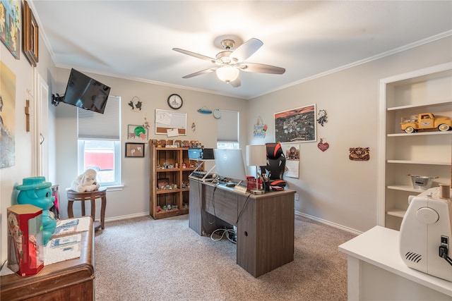 carpeted office featuring ceiling fan and crown molding