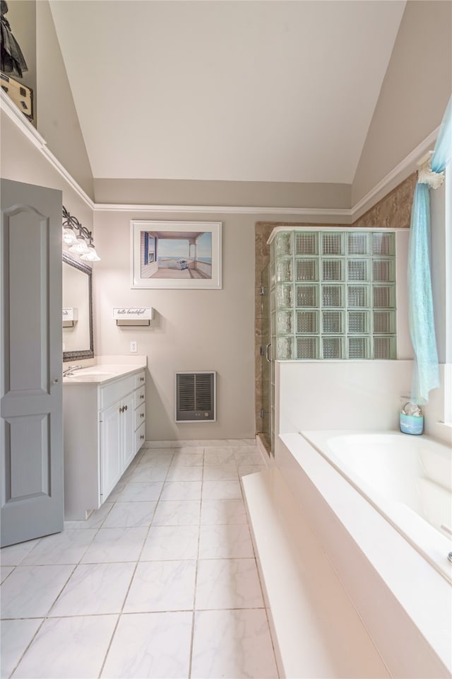 bathroom featuring walk in shower, vanity, heating unit, and vaulted ceiling