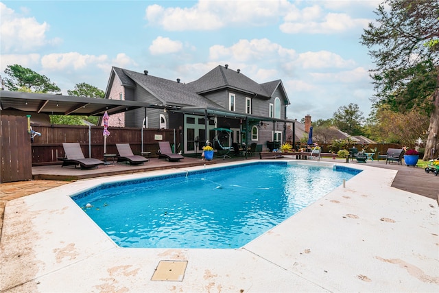 view of swimming pool with a patio area