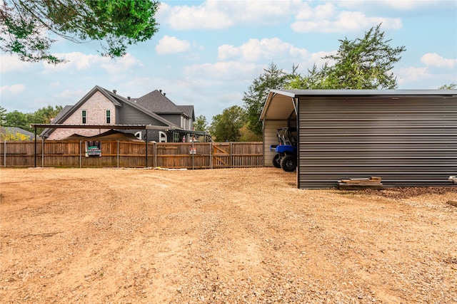 view of yard with a carport