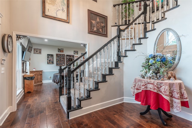 foyer with dark hardwood / wood-style flooring