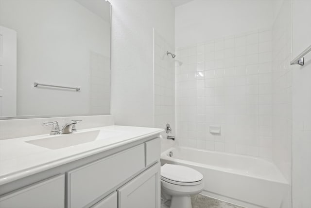 full bathroom featuring vanity, toilet, and tiled shower / bath