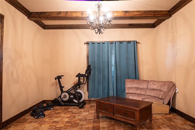 sitting room with a chandelier, ornamental molding, and beam ceiling