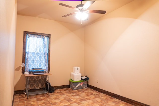 empty room featuring ceiling fan