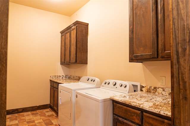 washroom with cabinets and independent washer and dryer