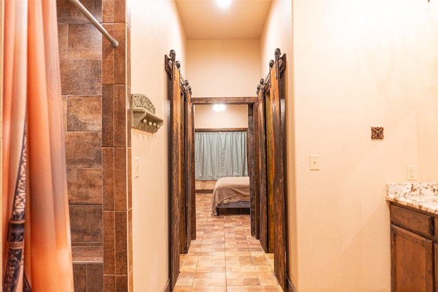 hallway with a barn door