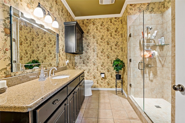 bathroom featuring vanity, tile patterned floors, a shower with door, and crown molding