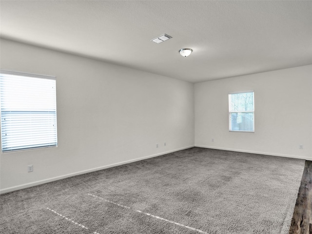 empty room with carpet floors