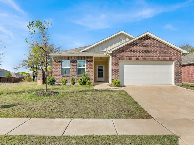 view of front facade featuring a garage and a front yard