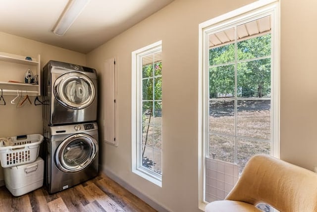 bathroom with hardwood / wood-style flooring, toilet, and an enclosed shower