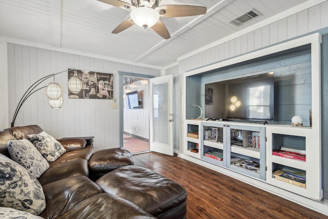 living room featuring wood walls, wood ceiling, hardwood / wood-style flooring, and beam ceiling