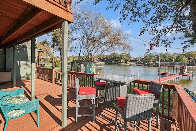 deck featuring a dock and a water view