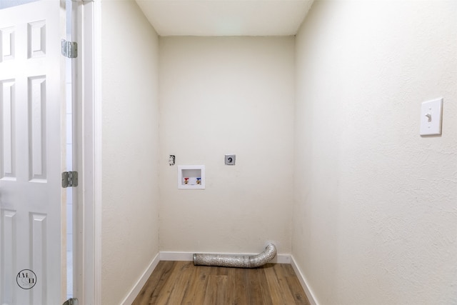 washroom with hookup for an electric dryer, wood-type flooring, and hookup for a washing machine