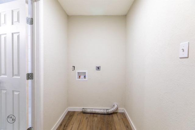 2318 May Ln, Grand Prairie, TX 75050 - laundry room featuring hookup for an electric dryer, hookup for a washing machine, wood finished floors, and baseboards
