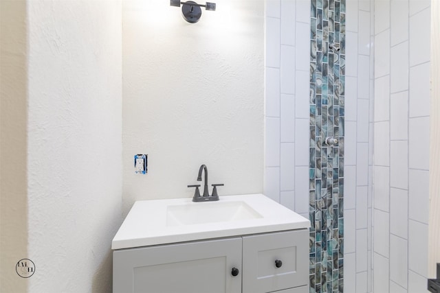 2318 May Ln, Grand Prairie, TX 75050 - bathroom featuring vanity and tiled shower