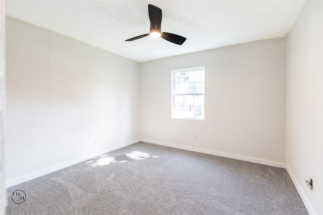 unfurnished room with a textured ceiling, ceiling fan, and carpet floors