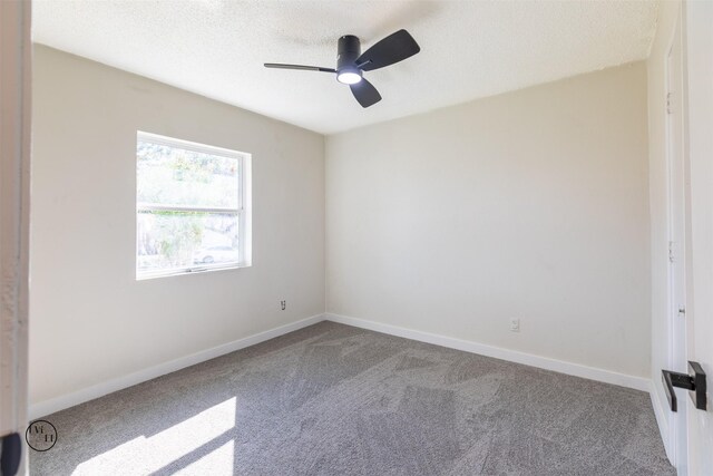 2318 May Ln, Grand Prairie, TX 75050 - carpeted spare room featuring baseboards, a ceiling fan, and a textured ceiling