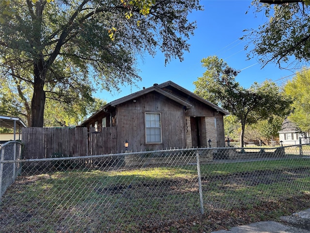 view of home's exterior featuring a yard