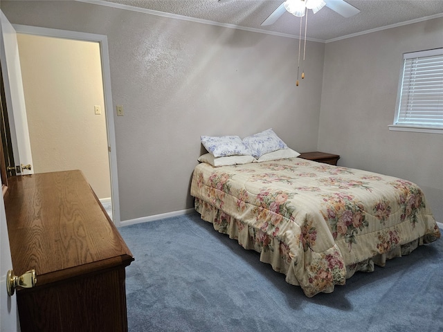 carpeted bedroom featuring a textured ceiling, ceiling fan, and crown molding