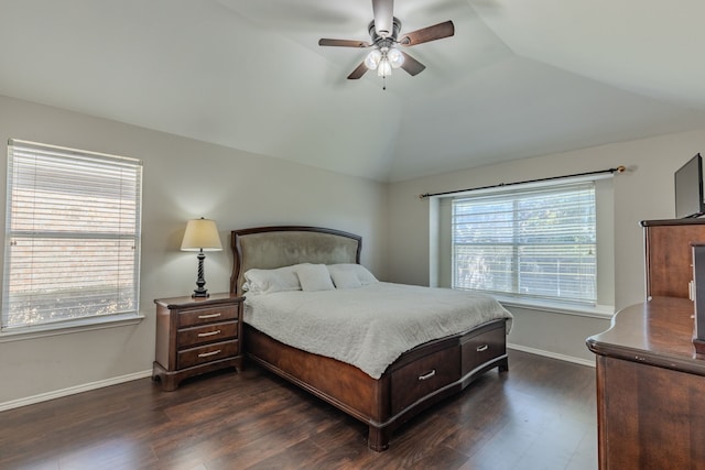 bedroom with ceiling fan, dark hardwood / wood-style floors, and lofted ceiling