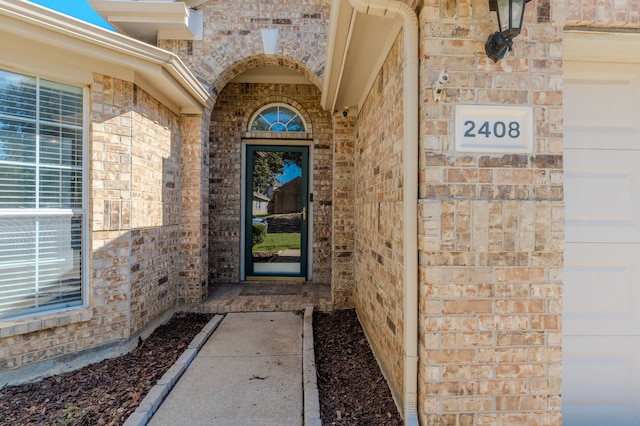 property entrance featuring a garage