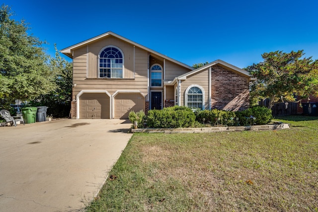 front facade with a front lawn and a garage