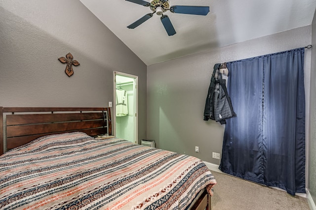 bedroom with light carpet, ceiling fan, and vaulted ceiling