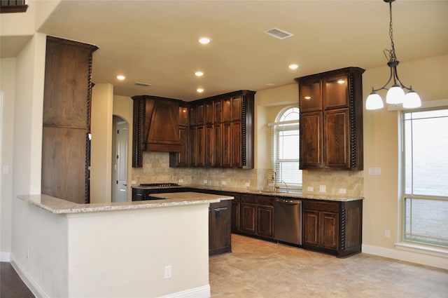 kitchen featuring kitchen peninsula, tasteful backsplash, custom exhaust hood, hanging light fixtures, and dishwasher