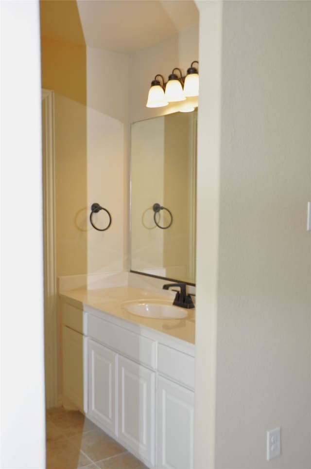 bathroom featuring vanity and tile patterned flooring