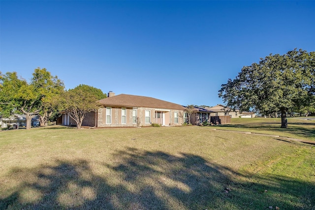 exterior space featuring a yard