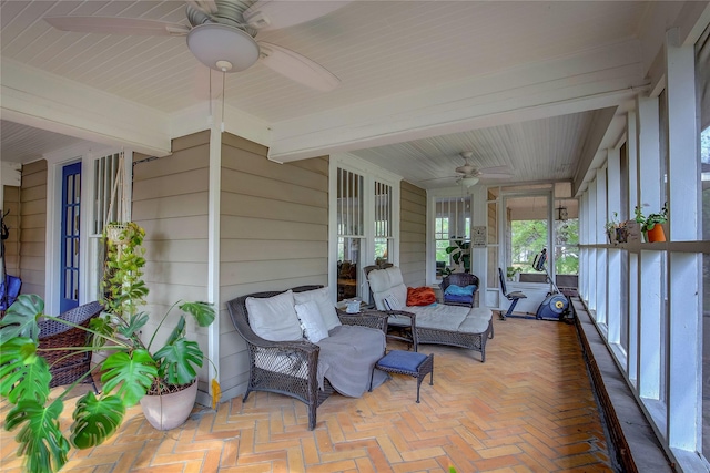339 N 1st St, Point, TX 75472 - sunroom / solarium featuring ceiling fan, plenty of natural light, and beamed ceiling