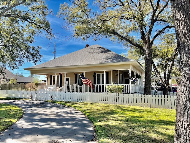 view of front of property featuring covered porch