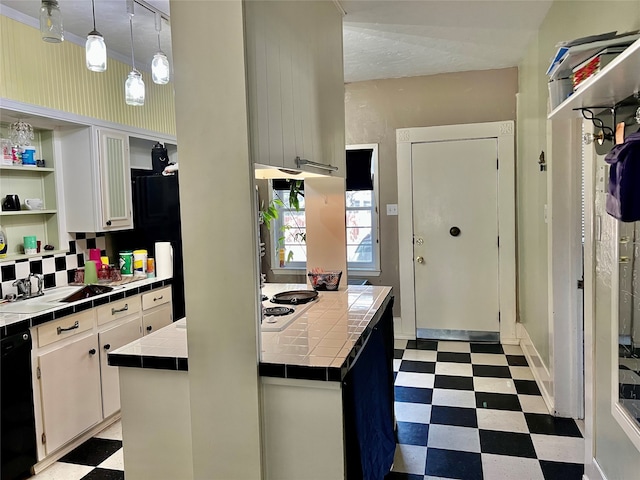 kitchen with white electric cooktop, tile countertops, tasteful backsplash, white cabinets, and wall oven