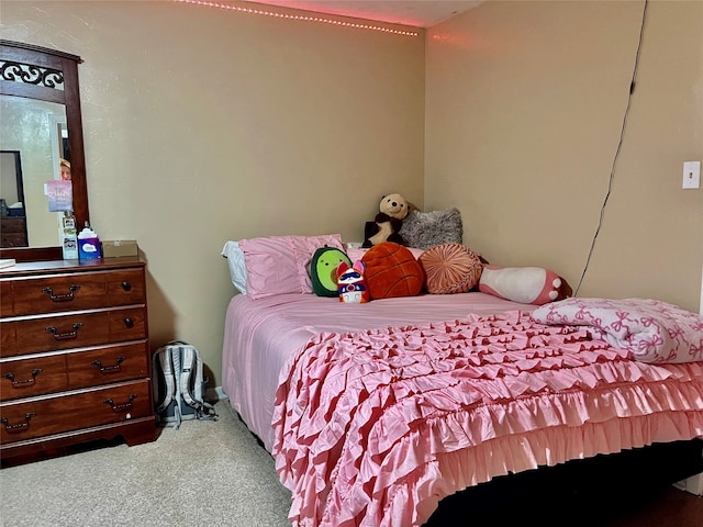 bedroom featuring dark hardwood / wood-style floors and ceiling fan