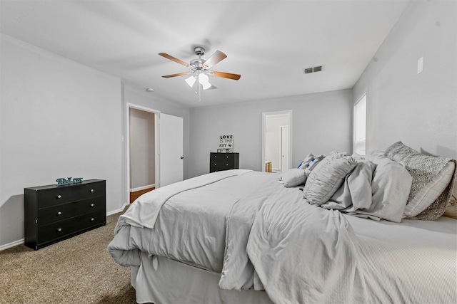 bedroom with ceiling fan and carpet flooring