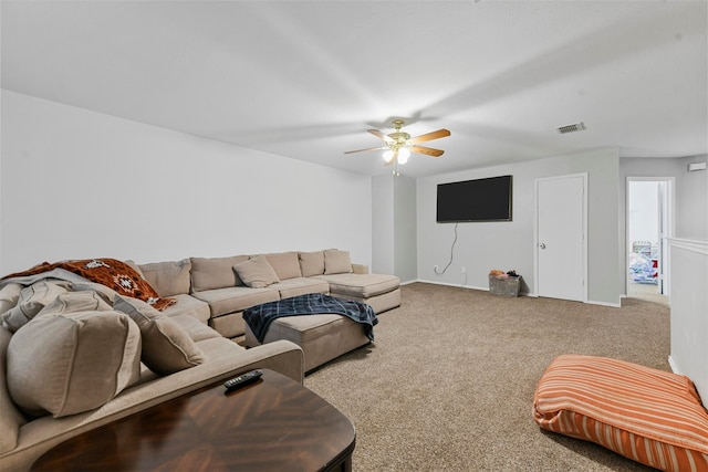 living room with carpet flooring and ceiling fan