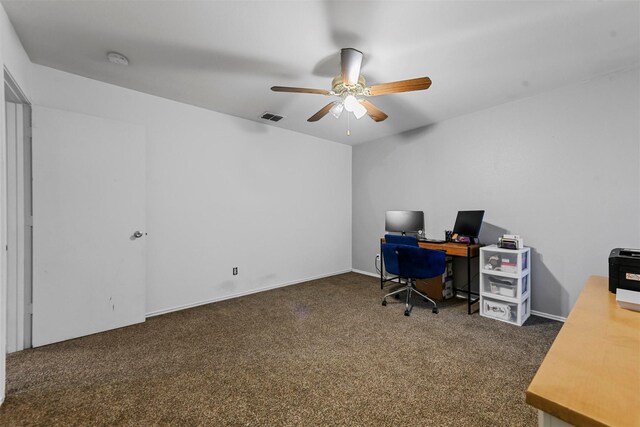 carpeted office with ceiling fan