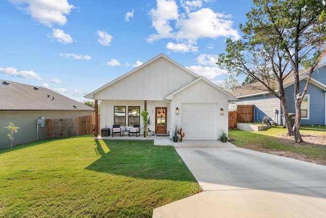 modern farmhouse style home featuring a garage and a front lawn