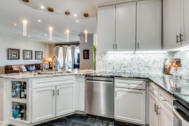 kitchen with stainless steel dishwasher, white cabinetry, sink, and kitchen peninsula