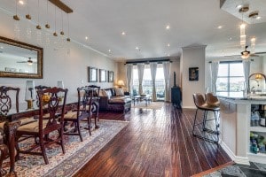 dining space with dark wood-type flooring and ceiling fan