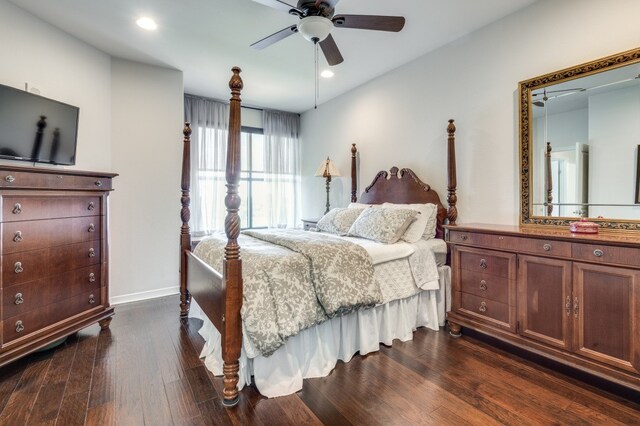 bedroom with dark wood-type flooring and ceiling fan