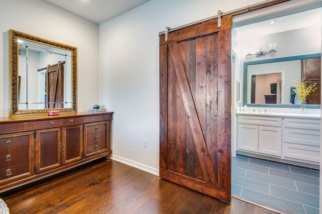 interior space featuring hardwood / wood-style flooring and vanity